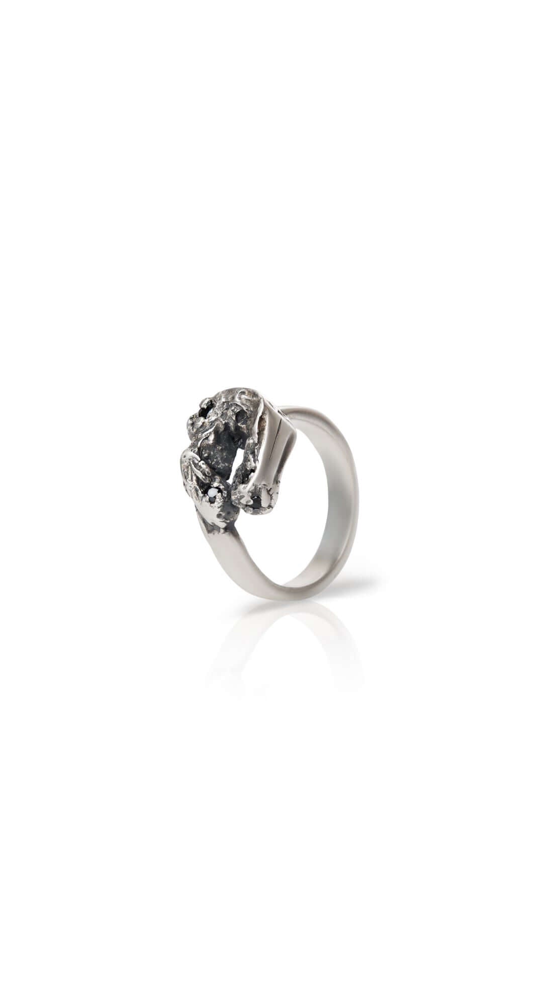 Handcrafted sterling silver Reborn ring featuring subtle details and a clean modern design