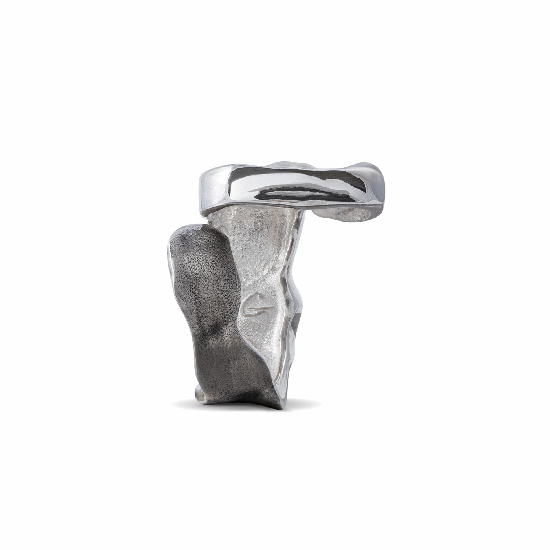 Unique silver ring handcrafted in Ukraine, showcasing artistic design.