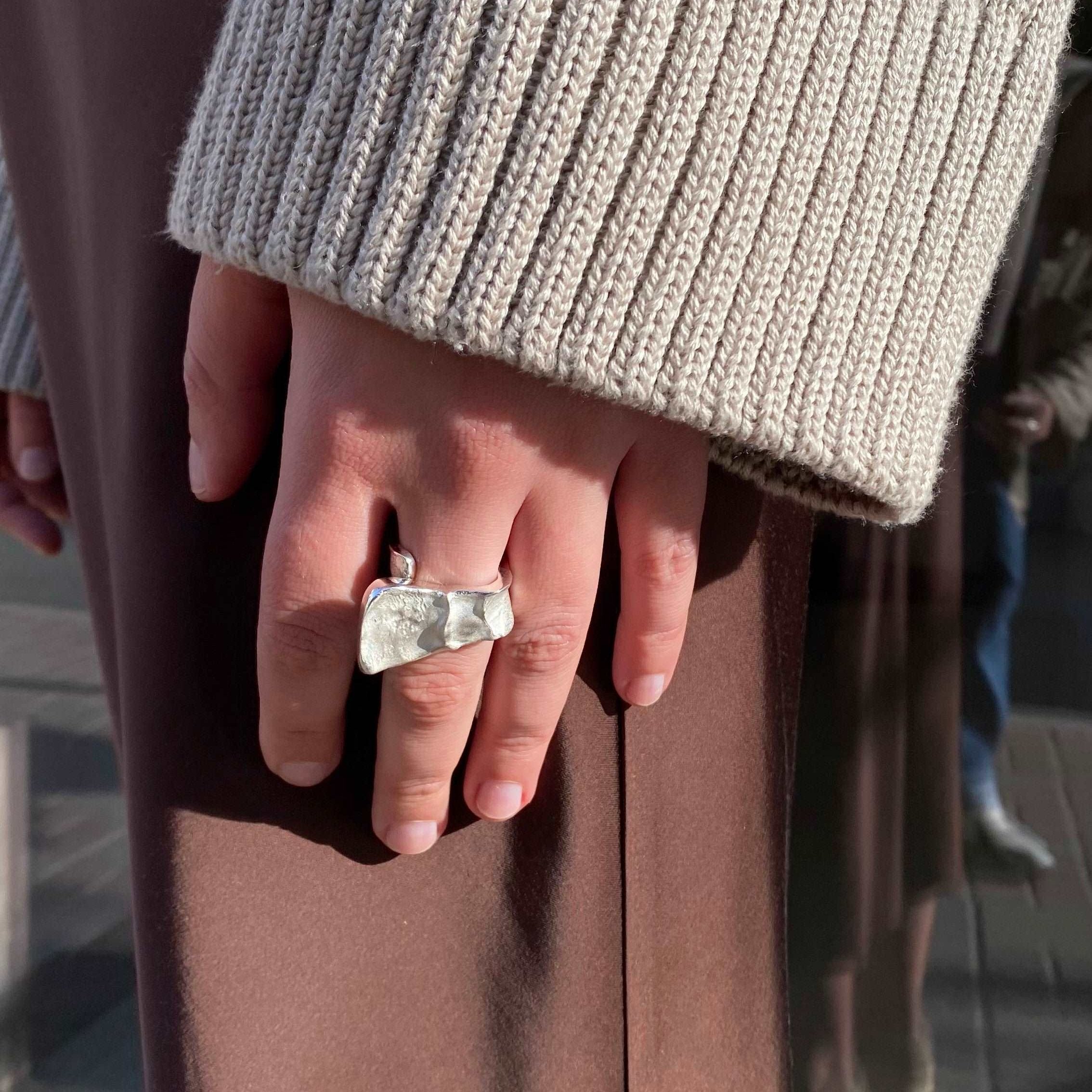 Sleek square-shaped men's ring highlighting architectural and geometric inspirations