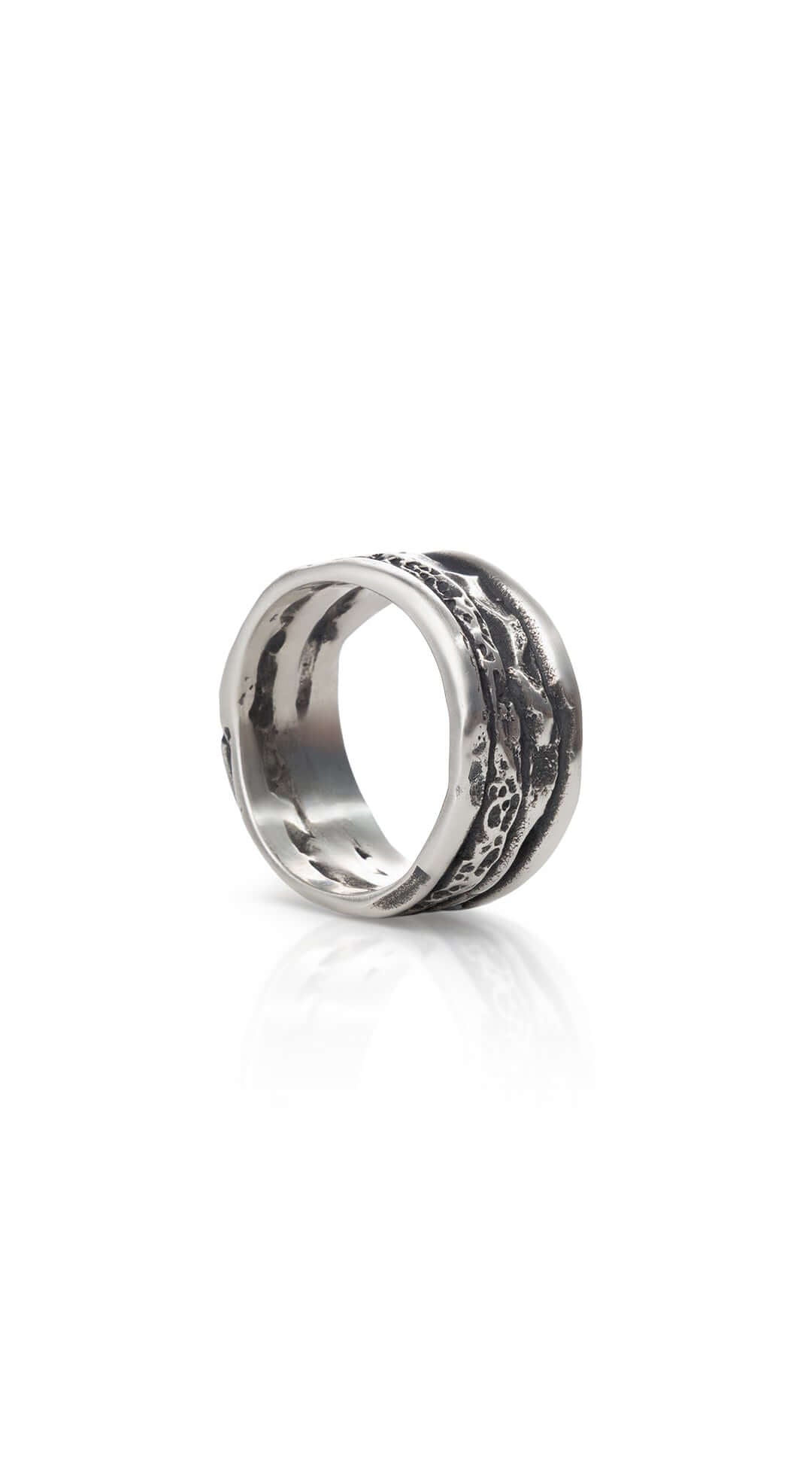 Handcrafted sterling silver wire ring with a bold black patina design