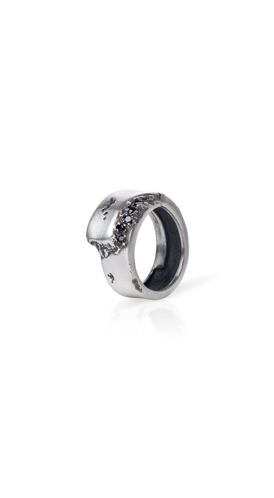 Handcrafted silver ring featuring refined detailing and a clean minimalist form