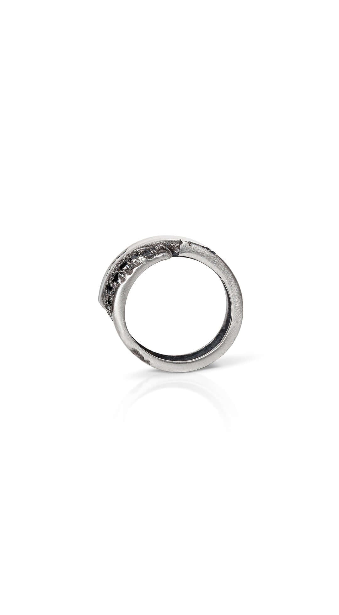 Handmade sterling silver ring with delicate details, designed for everyday wear