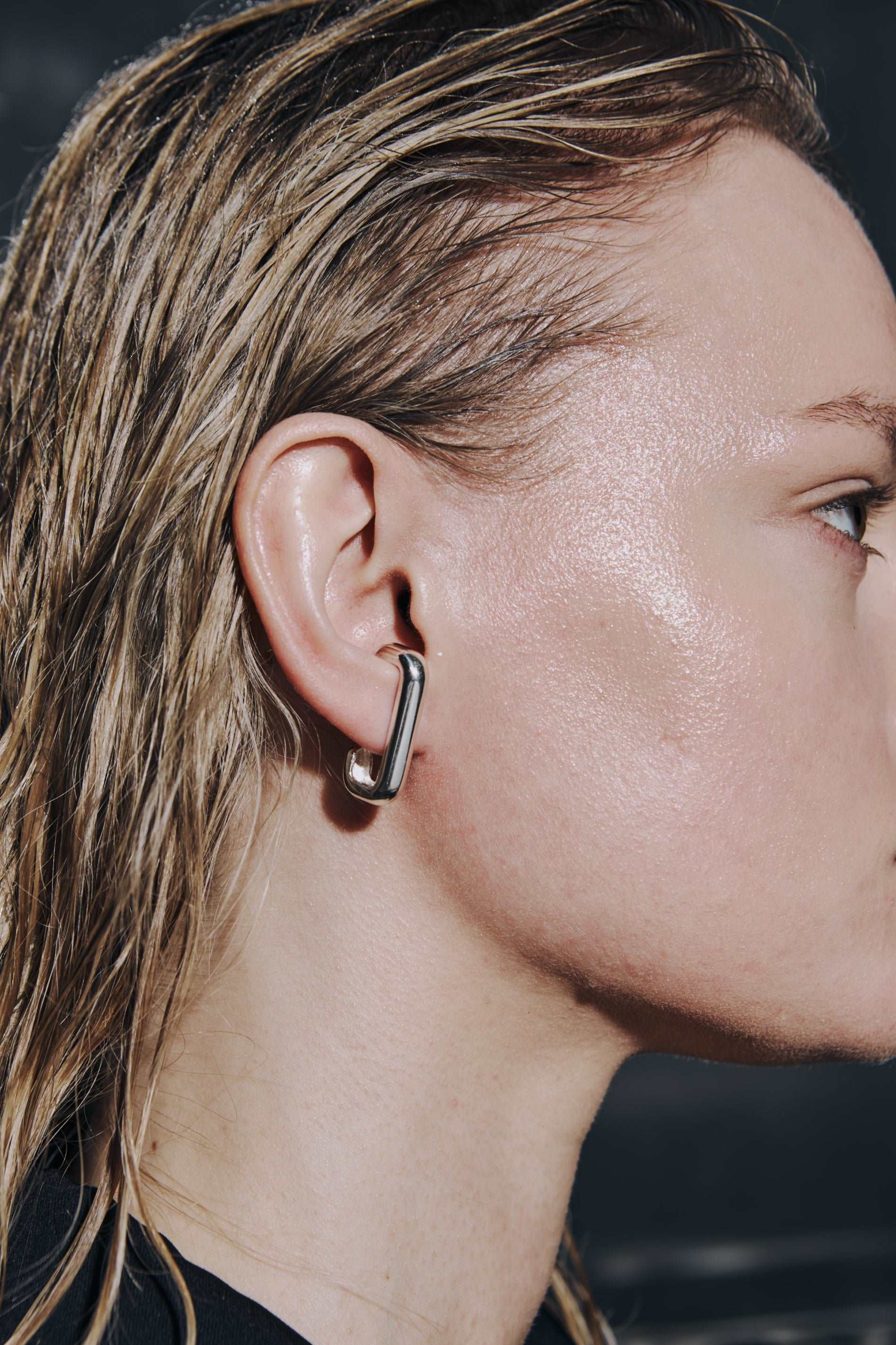 Sterling silver earring in a chunky suspender-inspired style.