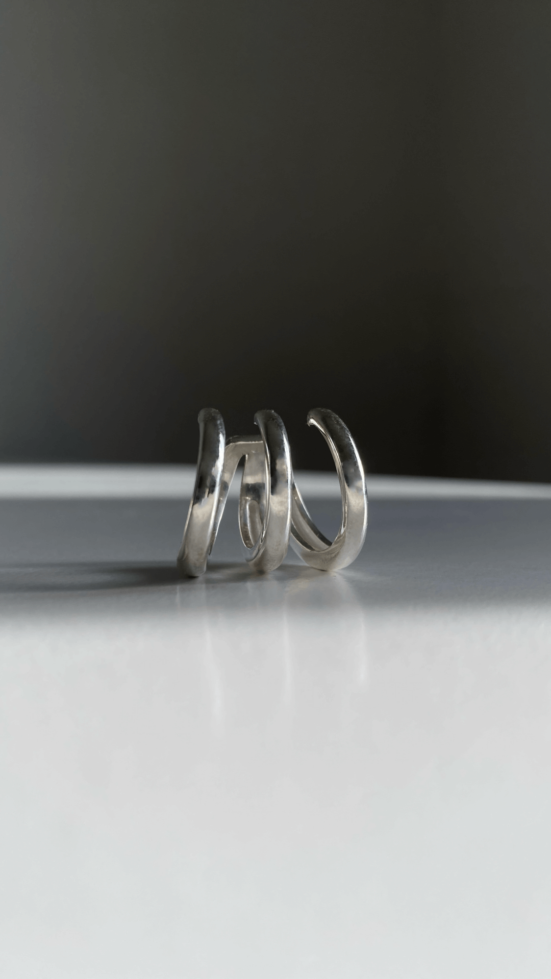 Modern sterling silver triple ear cuff designed and handmade in Ukraine by DYCH