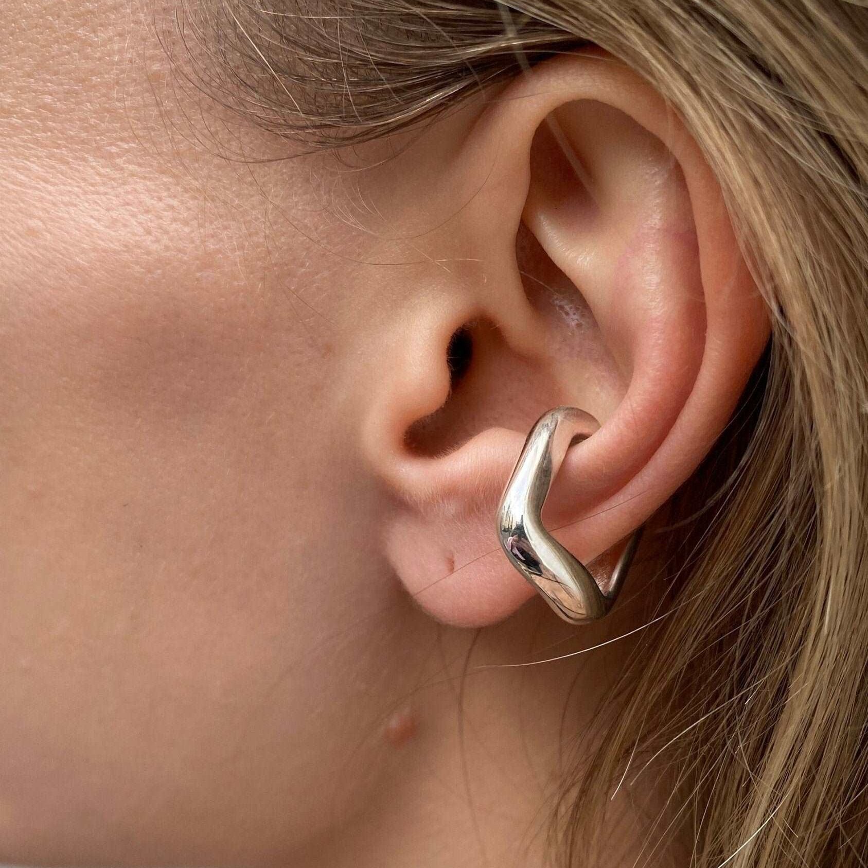 Big ear cuff in sterling silver with a bold and modern design.