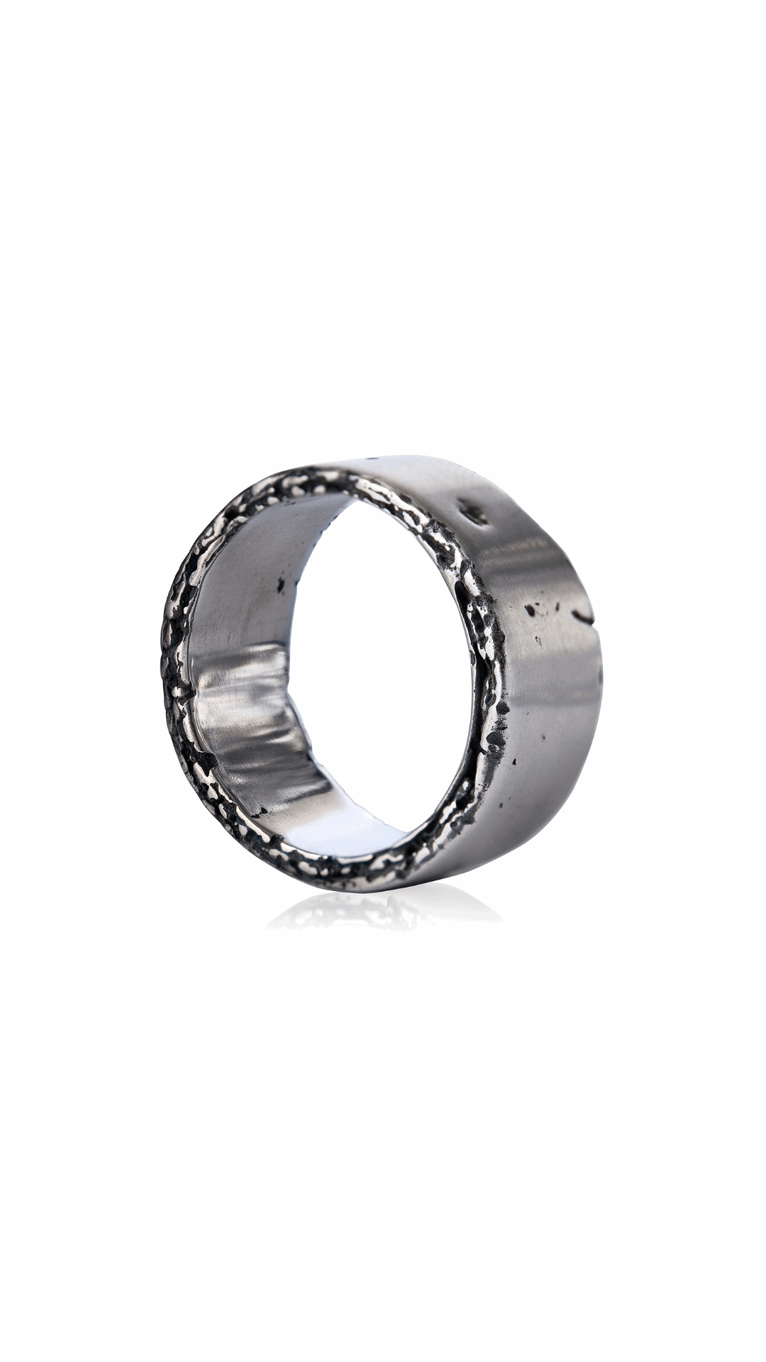 Irregular ring with a bold design, crafted from sterling silver.