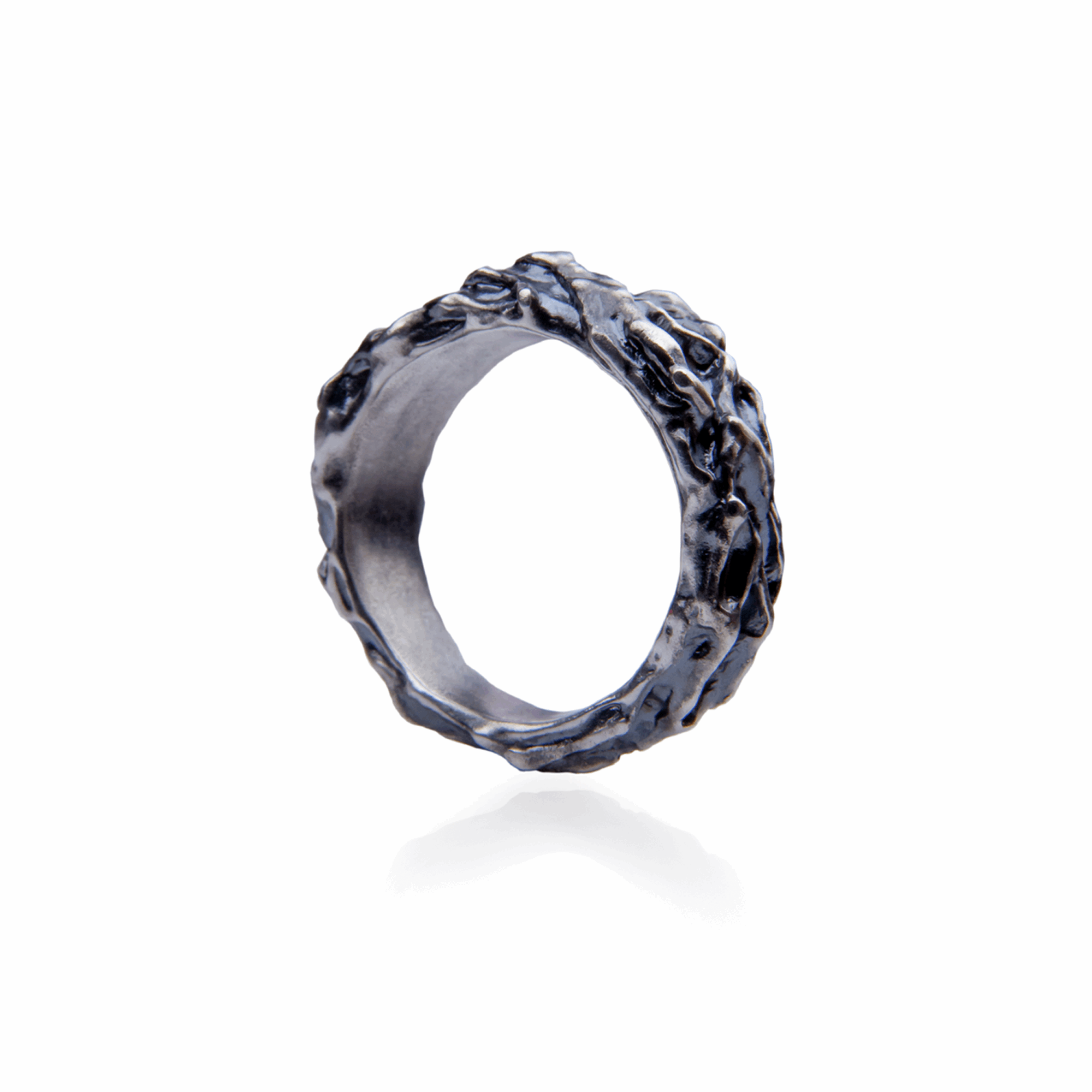 Handcrafted irregular textured silver ring with an elegant design and delicate details, perfect for everyday wear or as a gift. Material: Sterling Silver, black patina