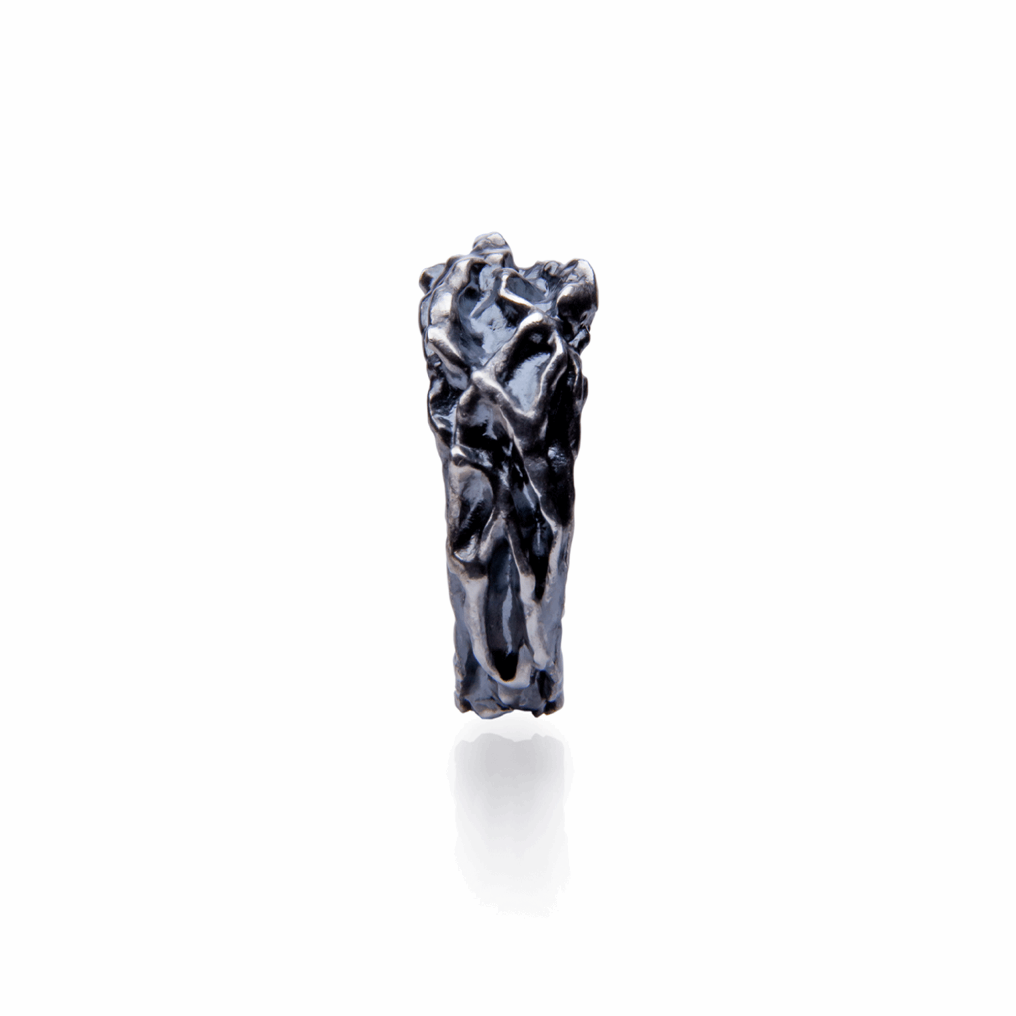 Textured ring crafted from sterling silver with intricate detailing.