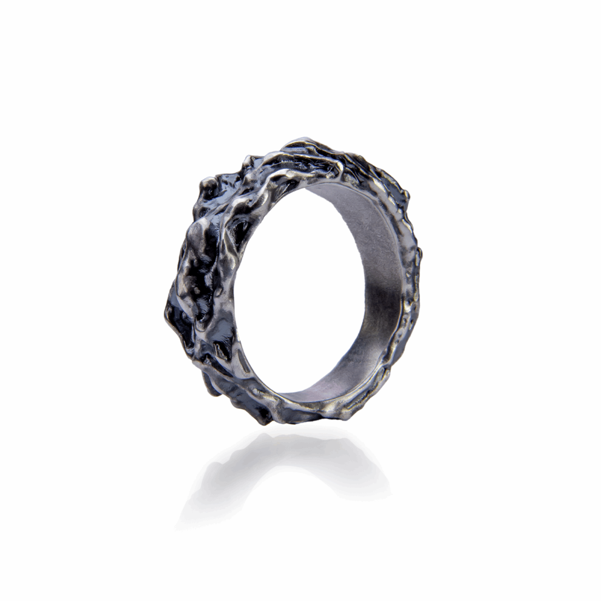 Irregular ring design enhanced with black oxidation and textured elements.