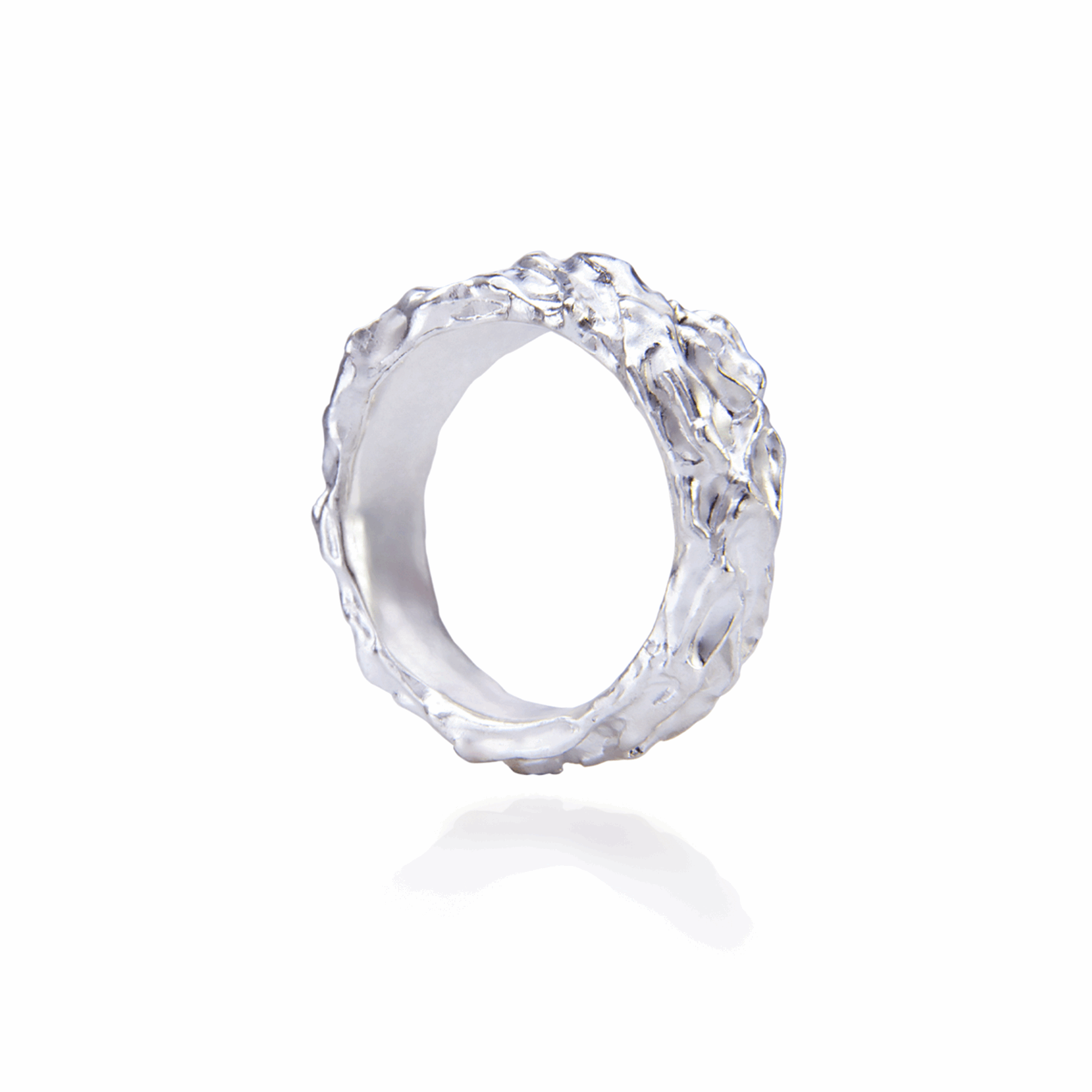 Designer ring with a textured finish, perfect for making a bold statement.