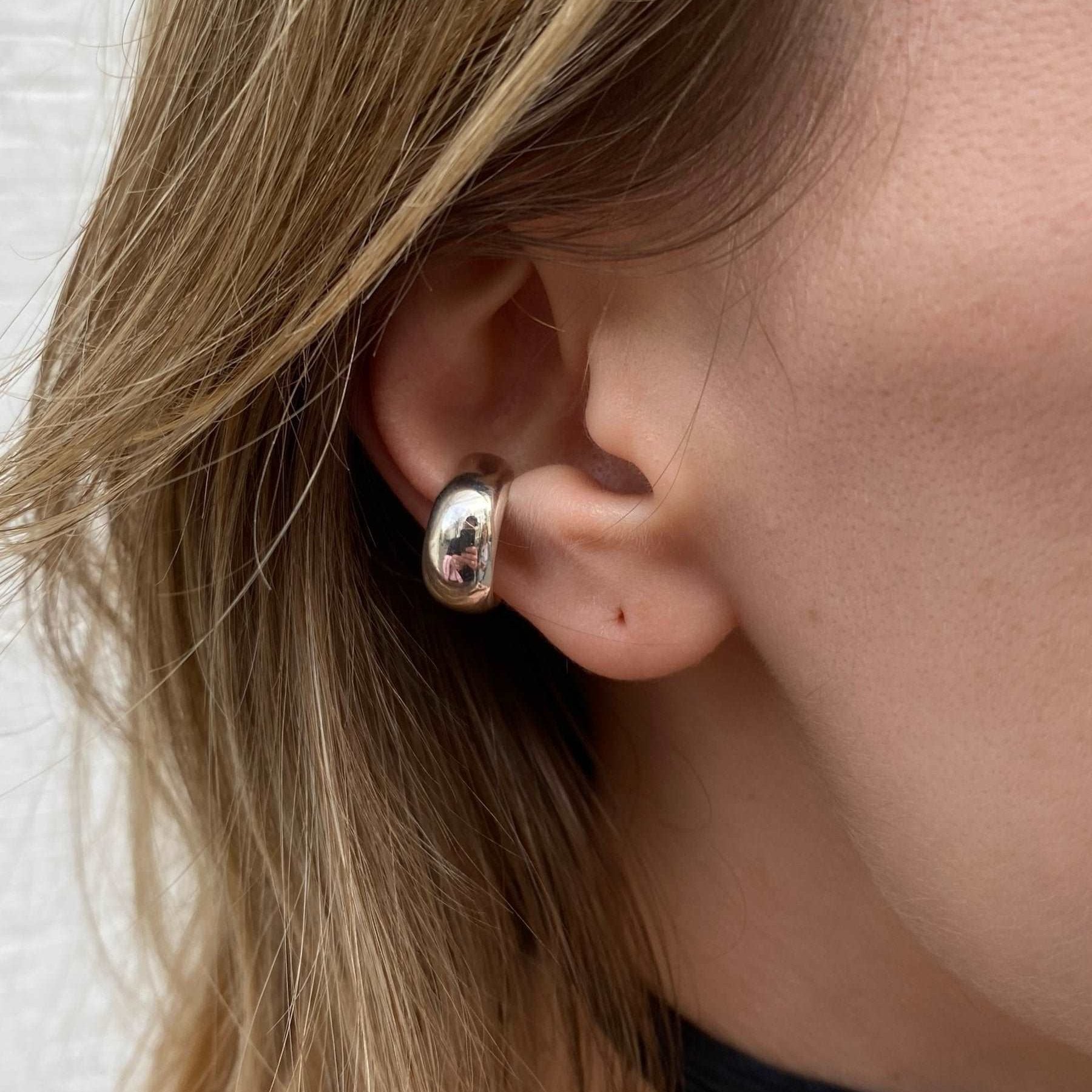 Non-piercing chunky ear cuff in sterling silver with a bold design.