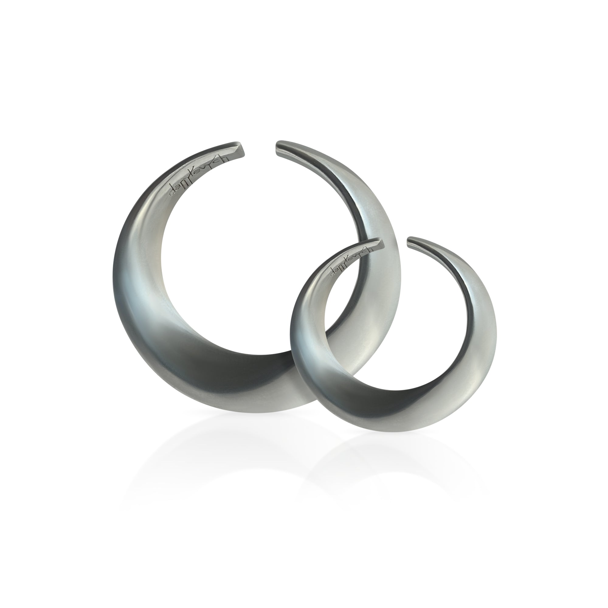 Unique cuff earring design for non-pierced ears in sterling silver.