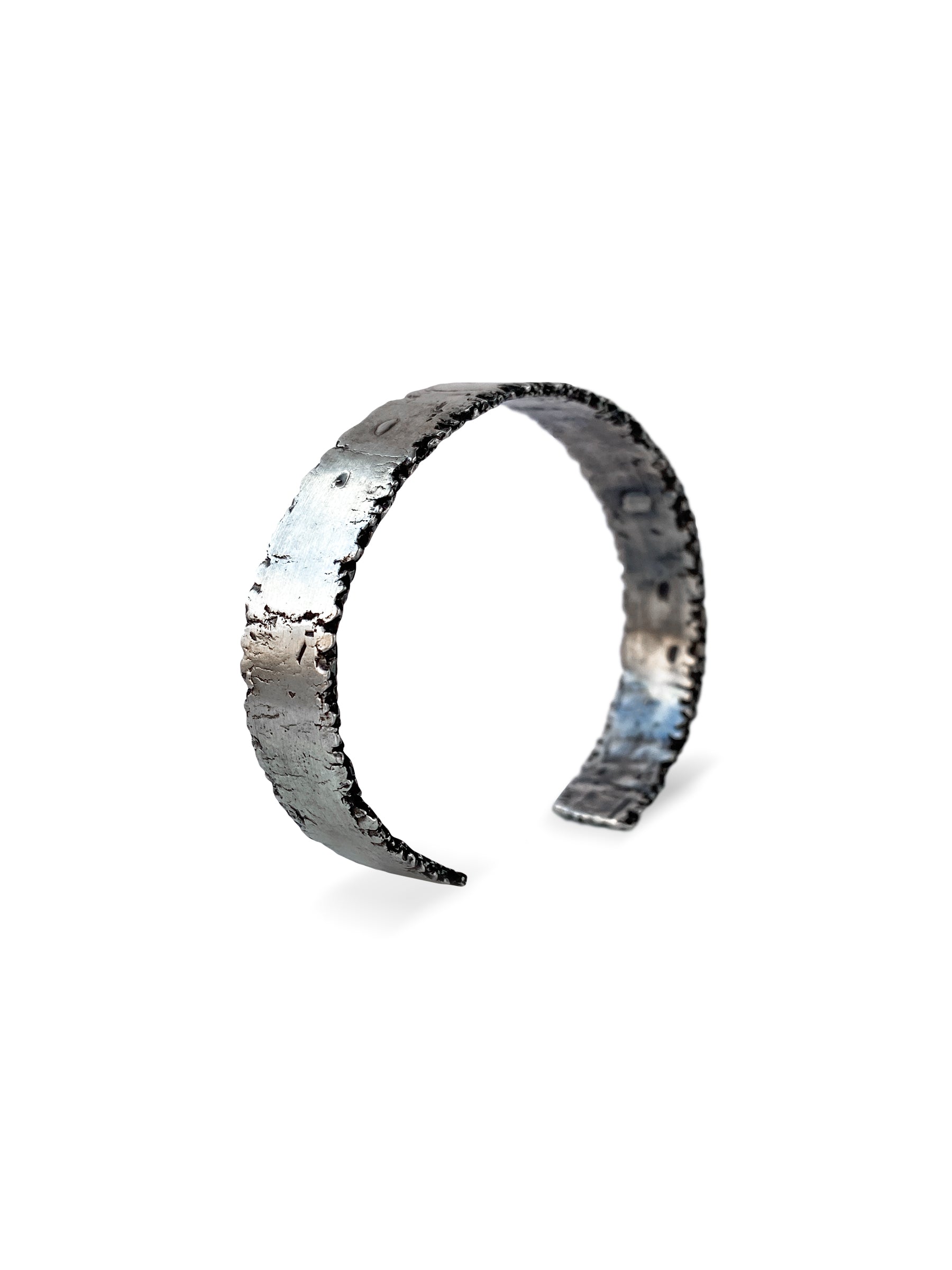 Ruget sterling silver bracelet with a textured design.