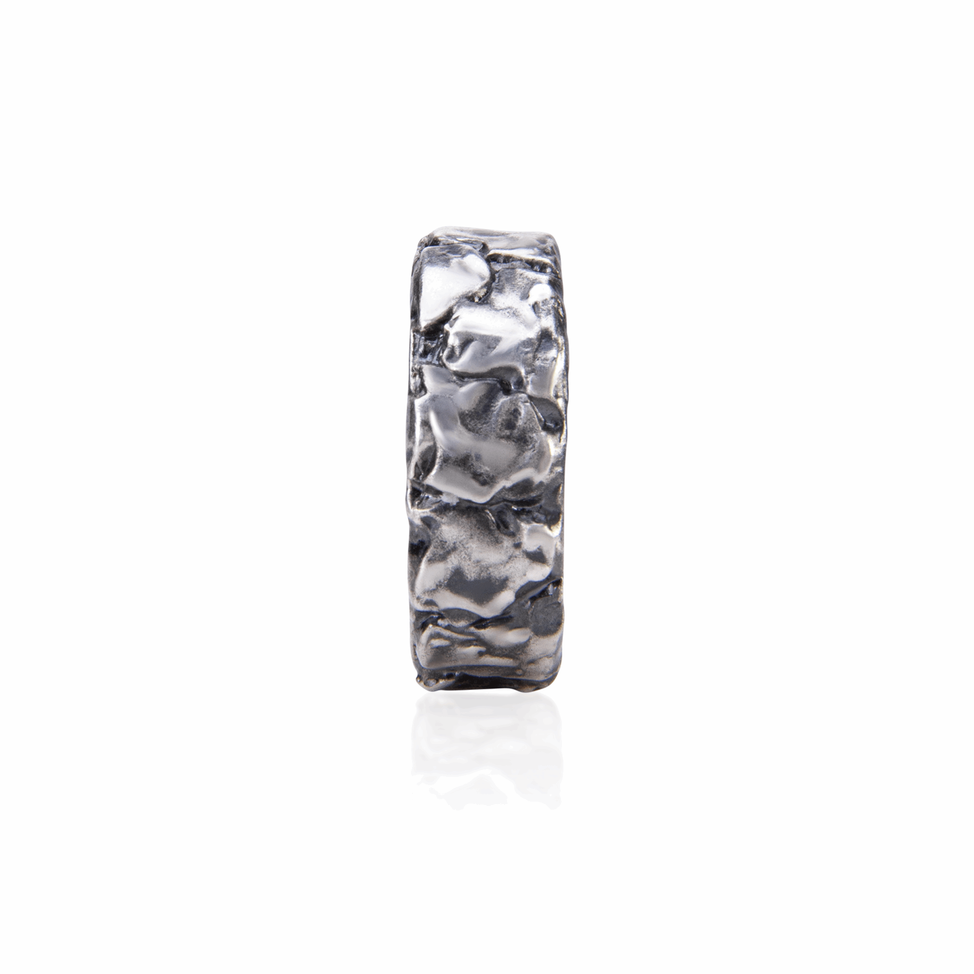 Stone Ring Irregular ring with a bold design, crafted from sterling silver.